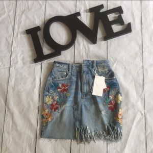 Zara TRF distressed embroidered denim miniskirt